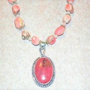 Rhodochrosite Beaded Necklace with Rhodonite Pendant, Rose Quartz and Silver Spacers and Silver Toggle Clasp   18-1/2in
