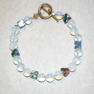 Opal Bracelet with Rainbow Metallic Spacers and Antique Gold Toggle Clasp