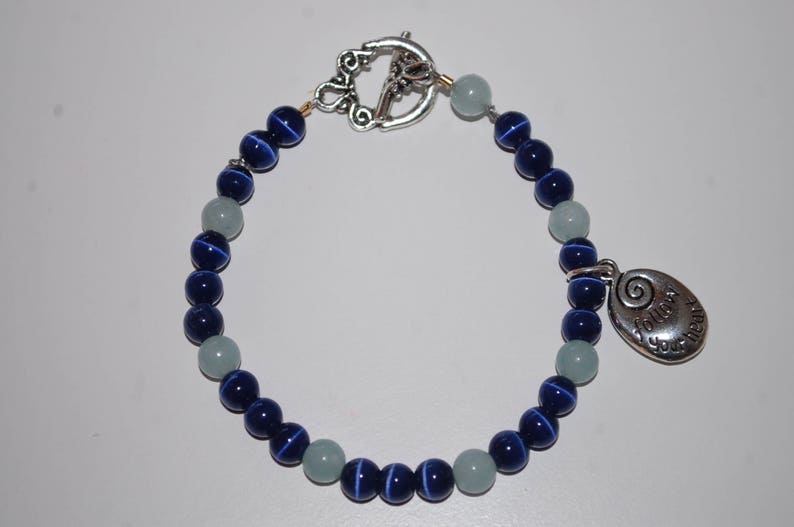 Dark Blue Cat's Eye and Aquamarine Beaded Bracelet with 'Follow Your Heart' Charm and Silver Toggle Clasp image 1