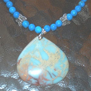 Beautiful Beaded Blue Turquoise Necklace with Blue Impression Jasper and Silver Butterfly Beads