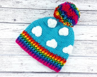 Rainbow Cloud Winter Bobble Hat, Sky Print Unisex Adult Beanie with Colourful Stripes & Fluffy Pom Pom, Kawaii Blue Chunky Crochet Toque Hat