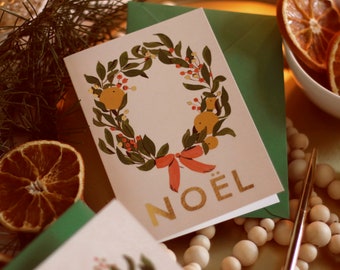 Carte de Noël couronne rose illustrée NOEL