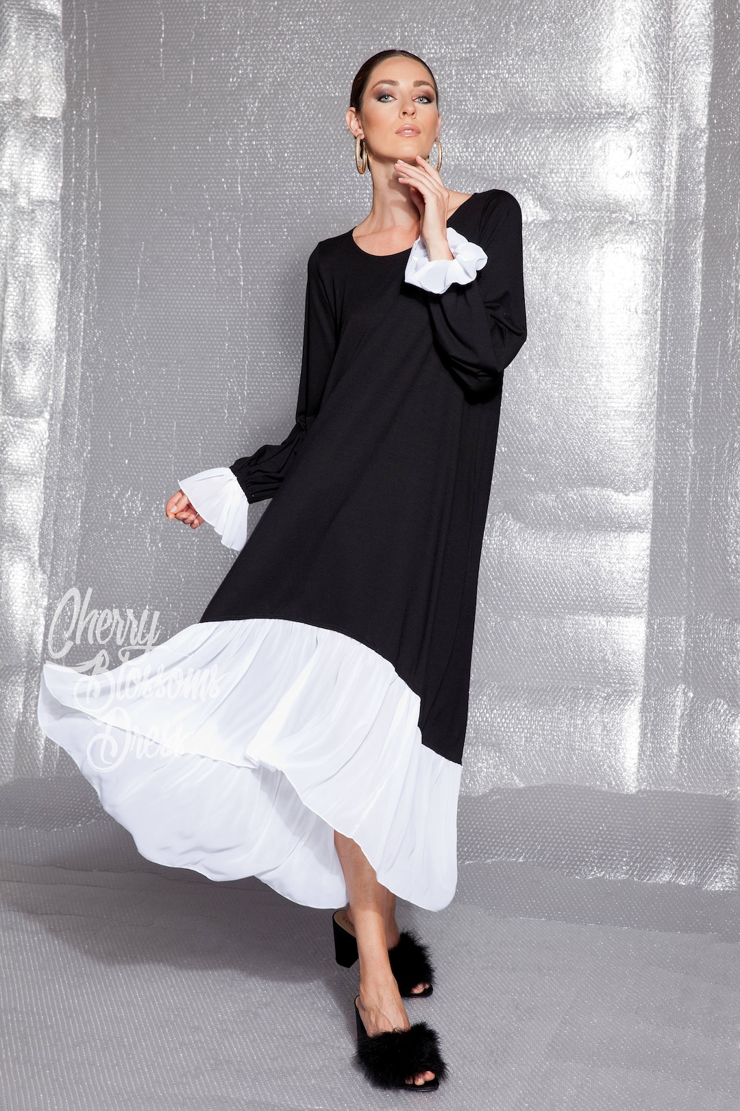 Abito lungo nero, abito asimmetrico, abito con volant, abito a