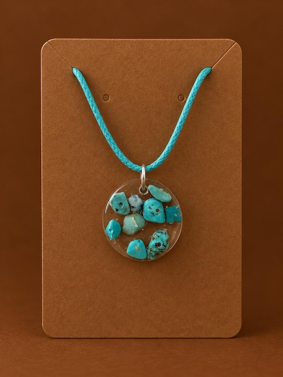 Handcrafted Resin Pendant Necklace: Blue Stone Encased Design