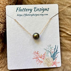 Collar de perlas flotantes de Tahití