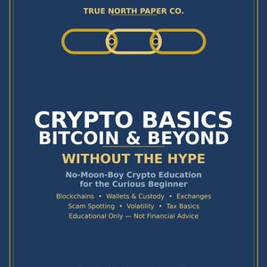 May include: A dark blue informational poster by True North Paper Co. featuring a gold chain link graphic. Text reads: Crypto Basics Bitcoin & Beyond Without The Hype, No-Moon-Boy Crypto Education for the Curious Beginner, and lists topics like Blockchains.