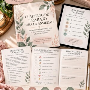 May include: A workbook titled Cuaderno de Trabajo para la Ansiedad with floral illustrations, alongside a tablet displaying grounding exercises, open pages with coping skills and reflection questions, and five circular icons at the bottom.