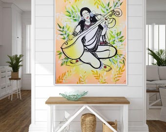 May include: A framed wall art print featuring a black and white line drawing of a person sitting cross-legged while playing a stringed sitar instrument, set against a soft peach background with green and yellow leaf illustrations.