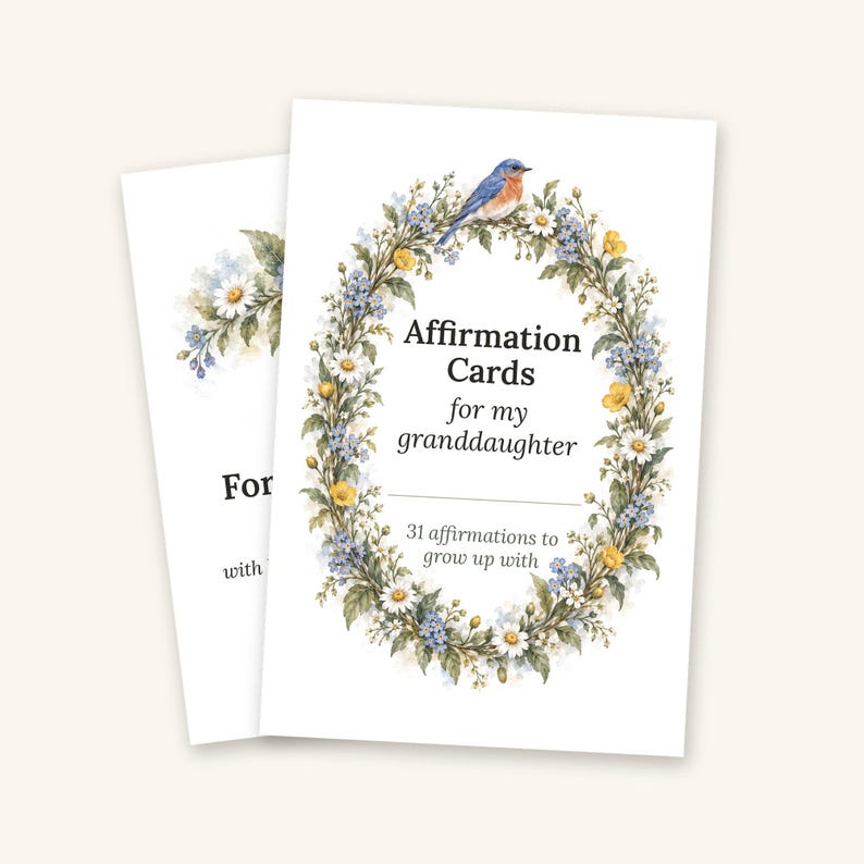 May include: A set of affirmation cards for my granddaughter featuring a floral wreath illustration with a bluebird, yellow and white flowers, and green leaves. The text reads: Affirmation Cards for my granddaughter, 31 affirmations to grow up with.