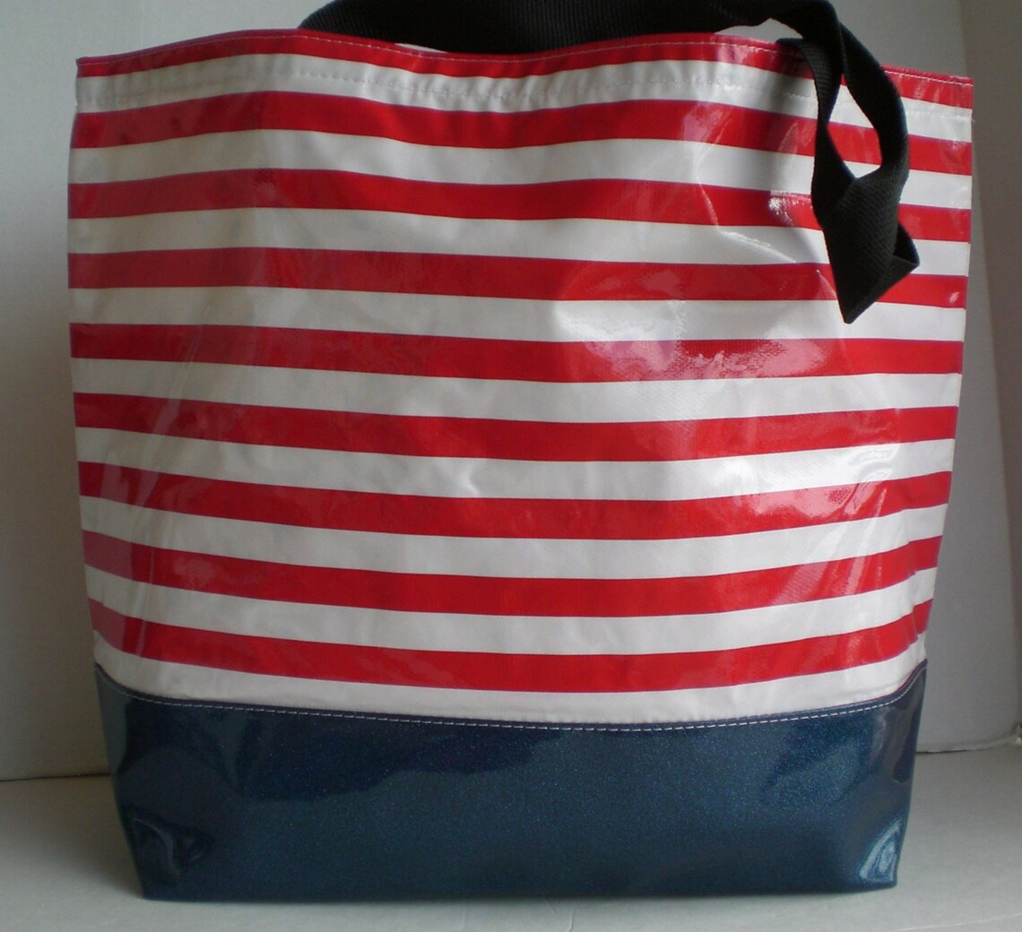 red and white striped beach bag