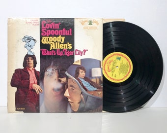 In Woody Allen's "Whats up, Tiger Lily?" The Lovin' Spoonful  - Record Vintage Vinyl Soundtrack LP 1966