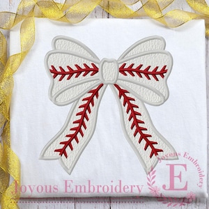 May include: White bow with red stitching, resembling a baseball, for embroidery.