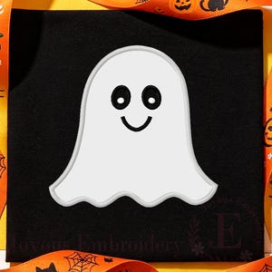 May include: A white ghost embroidery design featuring black oval eyes and a curved black mouth, centered on a solid black fabric square. The ghost has a rounded top and a wavy bottom edge, creating a simple, clean, and high-contrast graphic.