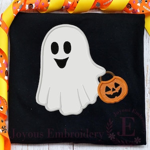May include: A white ghost with black eyes and a smiling mouth, holding an orange jack-o'-lantern. The ghost and pumpkin are on a black background, with a decorative ribbon border in orange, yellow, and white.