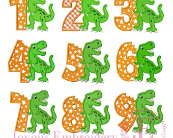 May include: A set of embroidered numbers 1 through 9, each paired with a green dinosaur. The numbers are orange, with star or plaid patterns. The dinosaurs have white teeth and are standing next to the numbers. The text "Joyous Embroidery" is at the bottom.