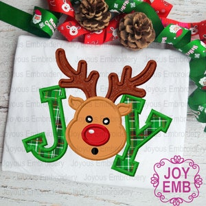 May include: Embroidered design of the word "JOY" with a plaid pattern and a red-nosed reindeer face in the center.