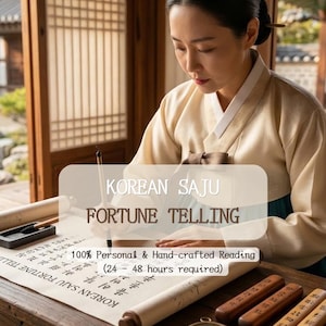 May include: A person wearing a cream-colored hanbok writes on a scroll with a brush. The text reads KOREAN SAJU FORTUNE TELLING and 100% Personal & Hand-crafted Reading (24 - 48 hours required). A compass and wooden blocks are on the table.