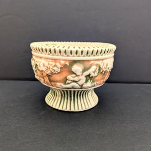 Antique Roseville Pottery Donatello Flower Frog With Vase 1916 Cherubs