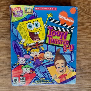May include: A blue box featuring Nickelodeon's "Toon Twister 3-D" software. The box art includes cartoon characters like SpongeBob SquarePants, and Jimmy Neutron. The box also has the text "Bonus CD-ROM Inside!"