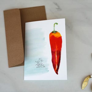 Tarjeta de chile rojo "Te amo más que a Chile"
