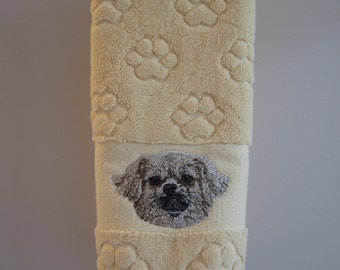 Tibetan Spaniel embroidered paw print hand towel