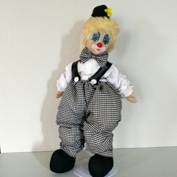 black and white clown doll