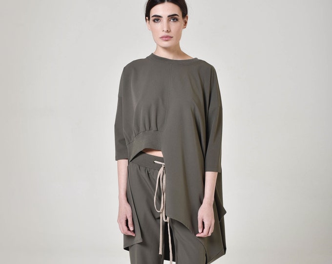 Asymmetric cut off blouse A02825