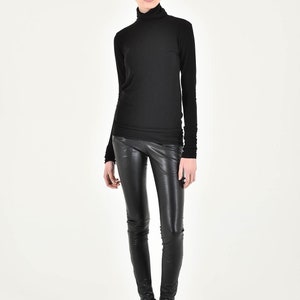 Faux Leather leggings with pockets and zippers A90229 image 1