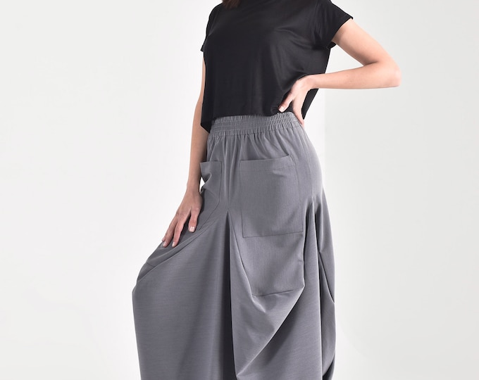 Maxi  Draped  Skirt Elastic waisline with deep from pockets  A90481