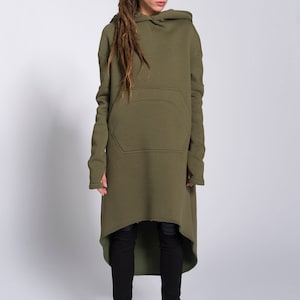 May include: A long, olive green hooded sweatshirt with a large pocket on the front. The sweatshirt has a high-low hemline and is made of a soft, comfortable fabric.