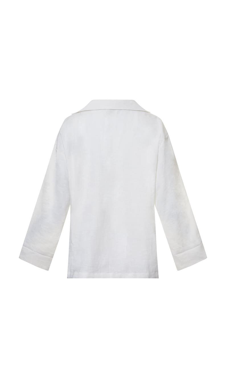 May include: A white long-sleeved shirt with a collared neckline. The shirt has a relaxed fit and a slightly cropped length.