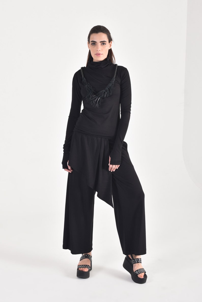 ASYMMETRIC PANTS IN BLACK RIB
