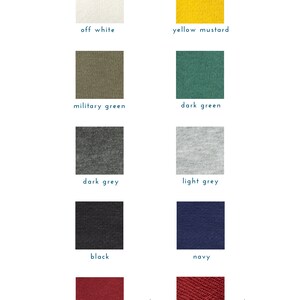 May include: Swatch card showing 10 different colors of french terry fabric. The colors are off white, yellow mustard, military green, dark green, dark grey, light grey, black, navy, burgundy, and red.