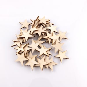 A pile of wood stars on a white background.
