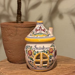 Vintage hand-painted Slovak folk art ceramic candle holder/luminary depicting the Bratislava Castle on the roof.