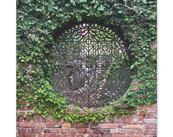 Decorative Ironwork Garden Window in Brick Wall - Photograph on Canvas