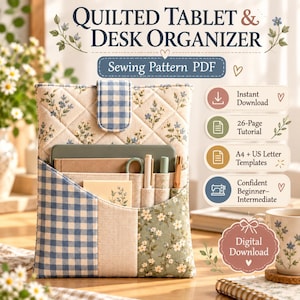May include: A quilted tablet and desk organizer sewing pattern PDF featuring a blue and white gingham tab closure, a floral print fabric, and multiple interior pockets holding pens and a tablet. Text includes Quilted Tablet & Desk Organizer.