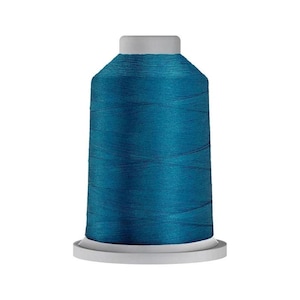 May include: A spool of vibrant teal thread wound tightly around a cylindrical core. The thread features a smooth, slightly reflective finish, and the spool is capped with a light gray plastic top and base, creating a clean, uniform appearance.