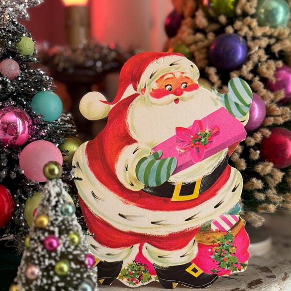 NOS Vintage Jovial Santa Claus with Present Merry Christmas Die Cut Old Collectible 1960s Era Holiday Decor Xmas Display Winter Prop Gift