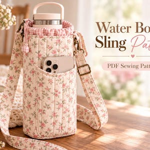 May include: A quilted fabric water bottle sling featuring a pink and green floral print, a drawstring top with pink gingham lining, an adjustable shoulder strap, and an exterior pocket containing a smartphone. Text reads Water Bottle Sling Pattern.