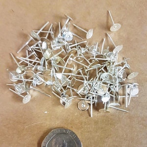 7mm silver plated earring flatback finding with 12mm  post. 12 in pack.