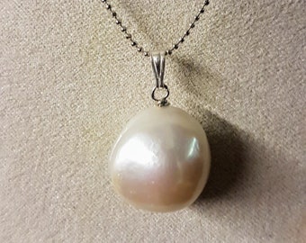 Baroque pearl pendant 20mm x 15mm (approx.) with sterling silver bail. Due to uniqueness of beads shapes & bail may differ slightly.