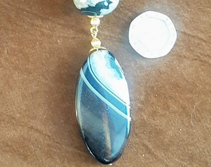 Botswanan agate and pale yellow fire agate beads.