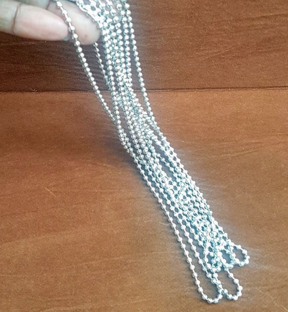 Silver ball chain. 50cm long. Highly polished finish. Non-tarnishing stainless steel. Very durable, very beautiful! Bling for him or her
