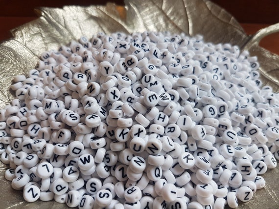 6mm black & white coin alphabet acrylic beads for fun children's projects. DIY craft projects, fun jewellery making for kids. Letter beads