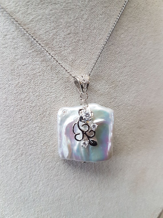Square baroque AAAA pearl pendant 20 x 20mm approx. with 925 silver bail & trim. Chain  not included.