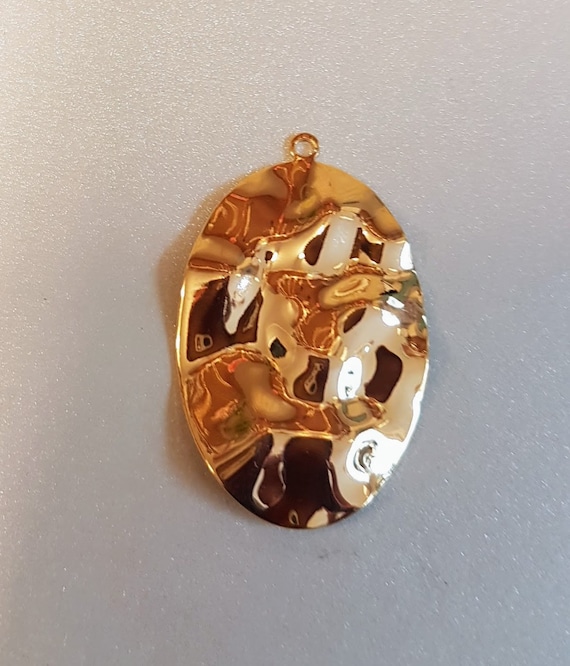 Large shiny oval connector or pendant. Gold plated brass finding. 45mm x 33mm Very beautiful!