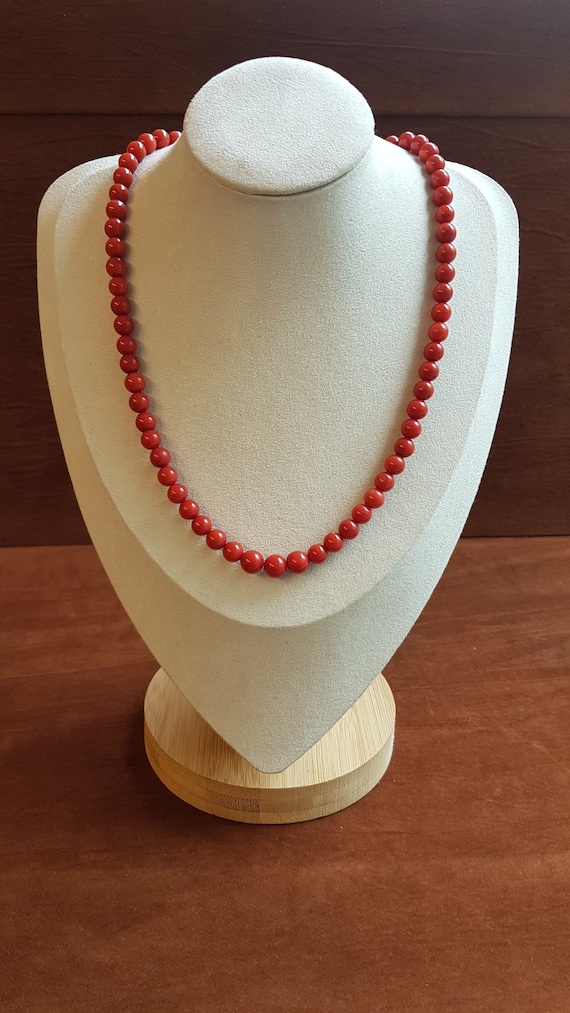 20" Real red coral beaded necklace. Simple and dynamic. Beads are 7mm and clasp is sterling silver.