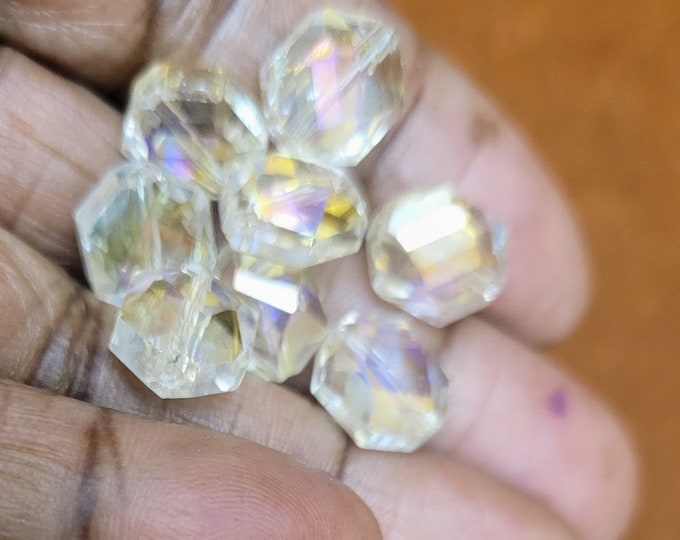 Octagonal faceted crystal beads with AB effect. 8 beads in a pack.