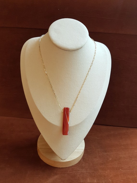 Gorgeous Carnelian Rectangular Pendant. Beautiful stone texture. Polished and shaped genuine gemstone. Simple and elegant.